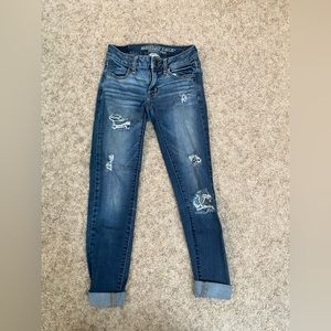 American Eagle Outfitters dark blue rip jeans